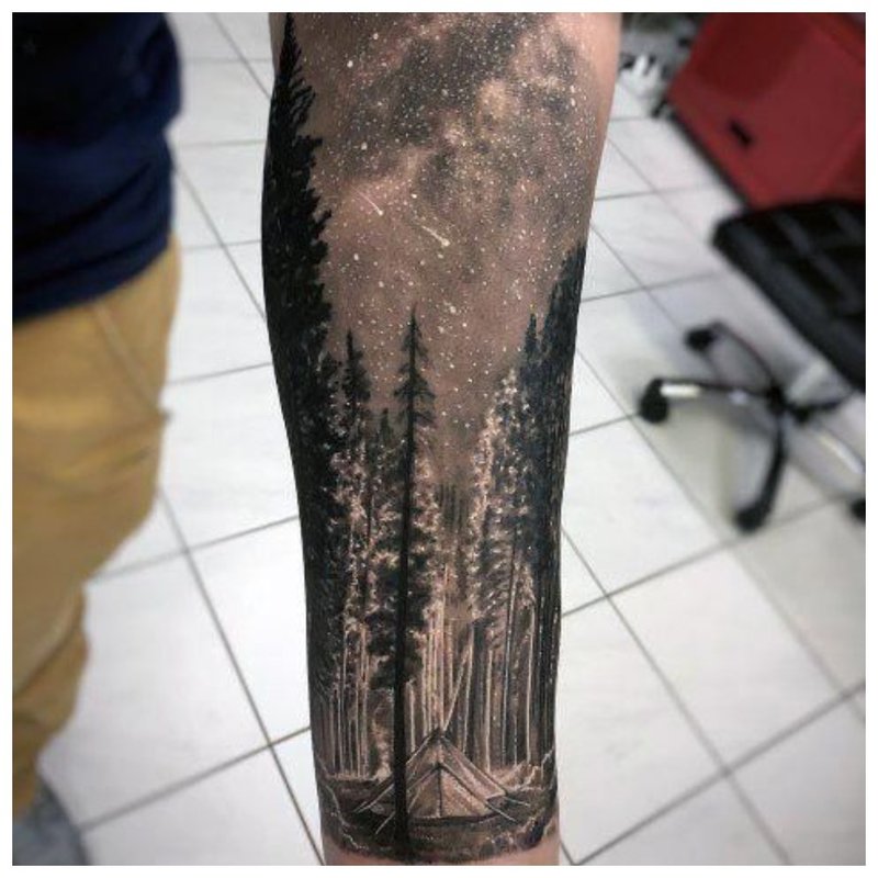 Men's full arm tattoo