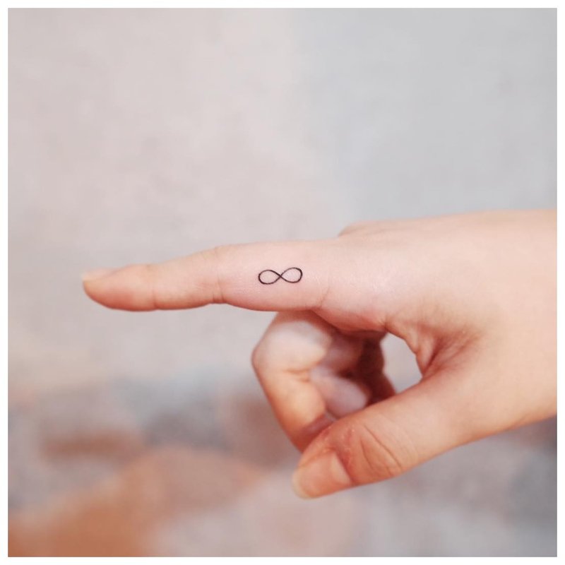 Infinity symbol on the finger