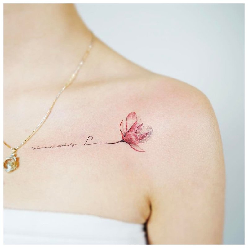 Color tattoo clavicle sprig