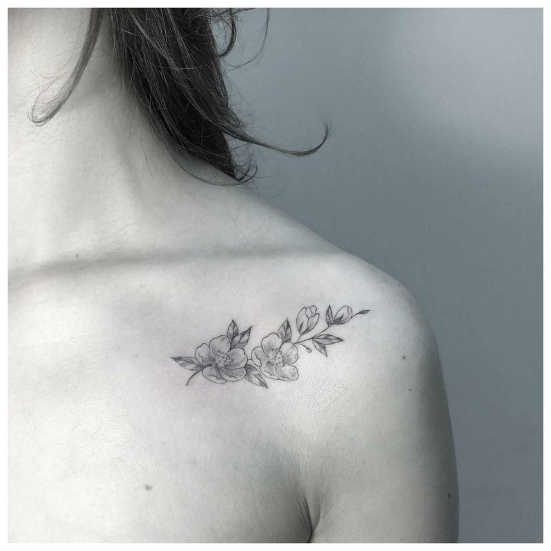 Tender clavicle twig tattoo