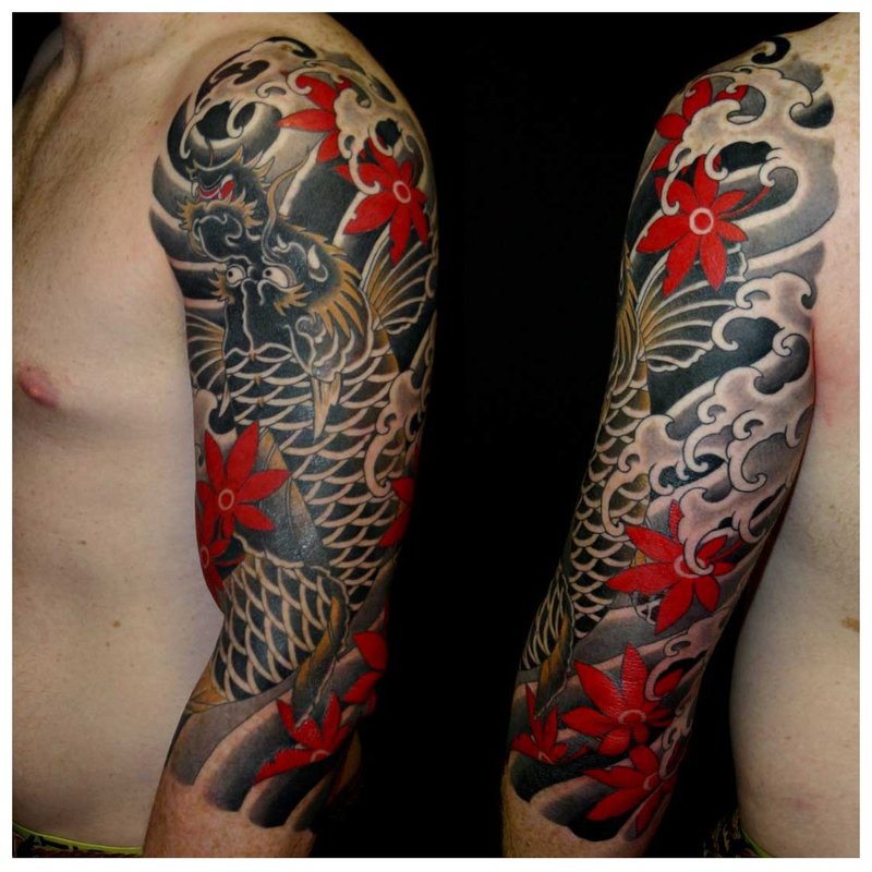 Red and black dragon tattoo