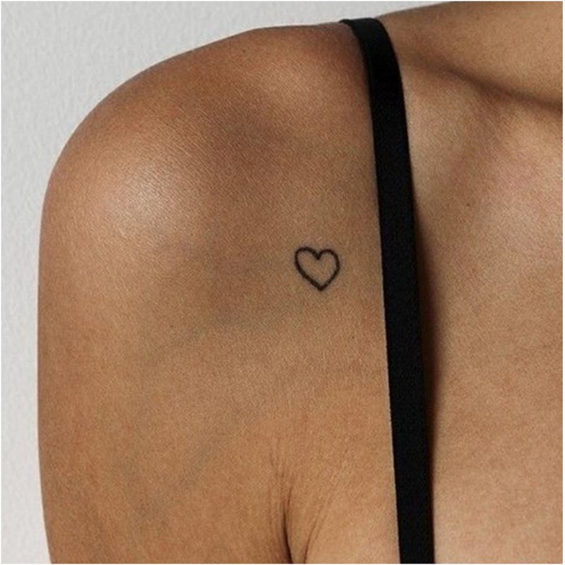 Mini heart tattoo