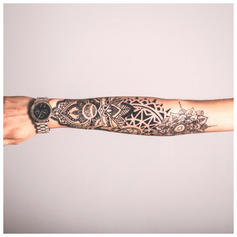 Female full arm tattoo