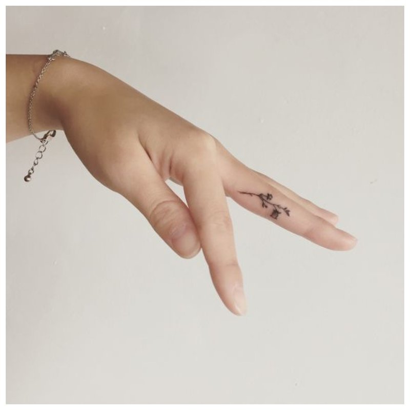 Finger tattoo