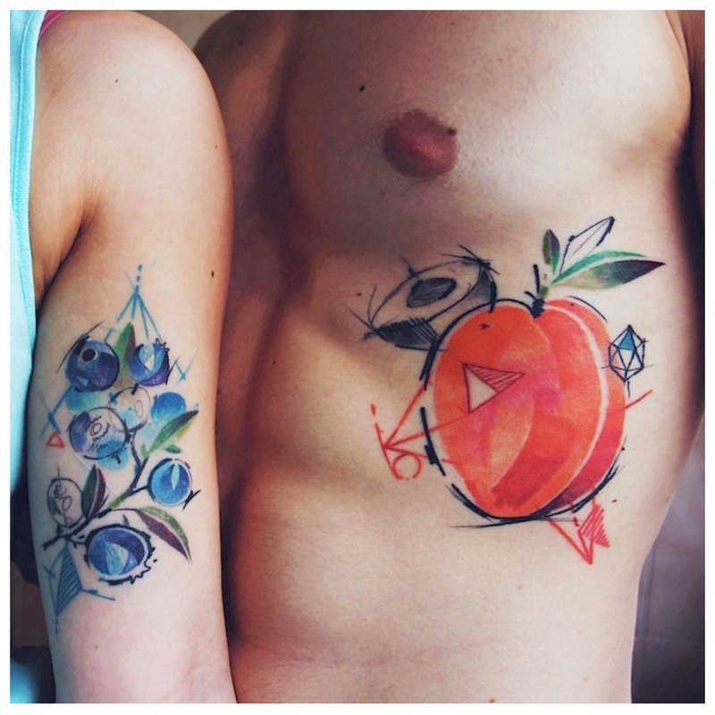 Paired tattoos in a watercolor style.