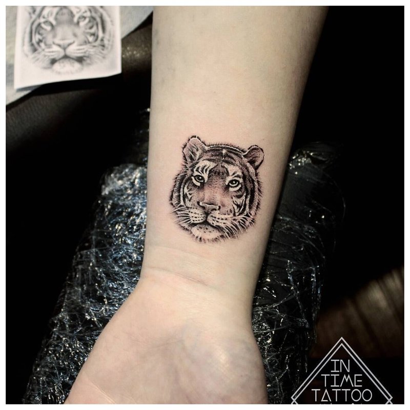 Animal wrist tattoo