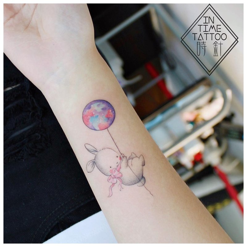 Animal wrist tattoo