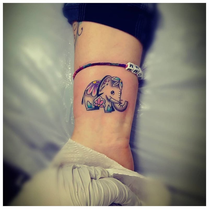 Elephant - beautiful arm tattoo