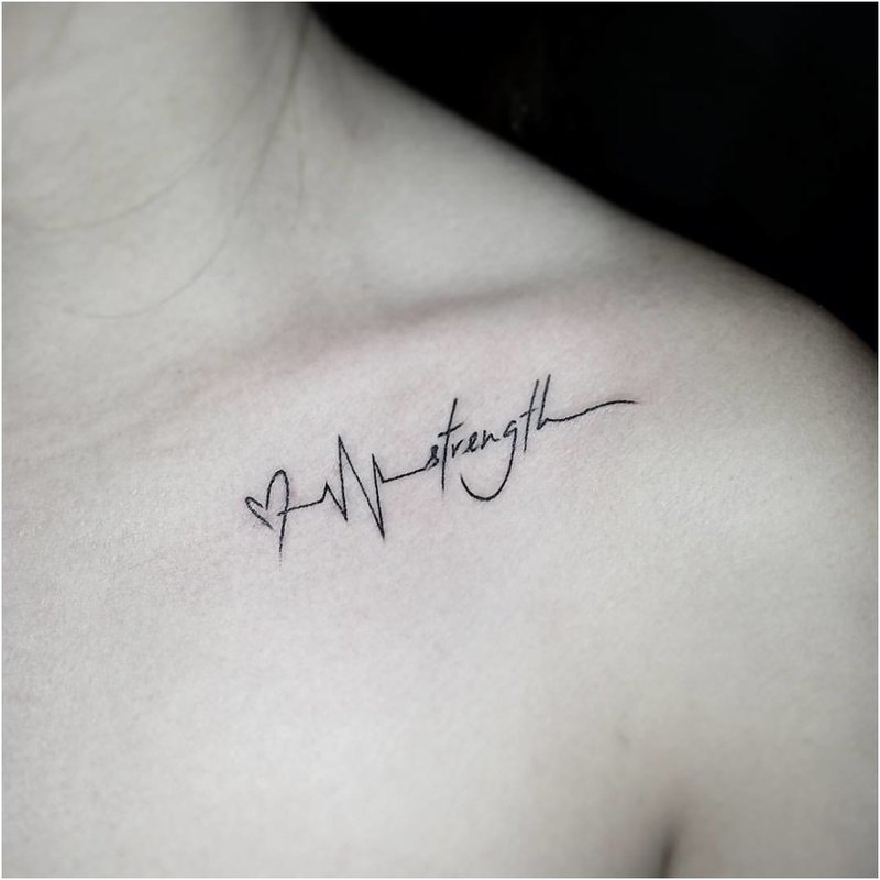 Lettering with a heart under the collarbone