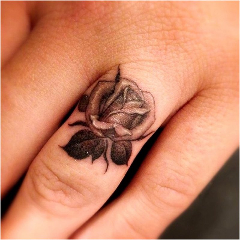 Rose tattoo on finger