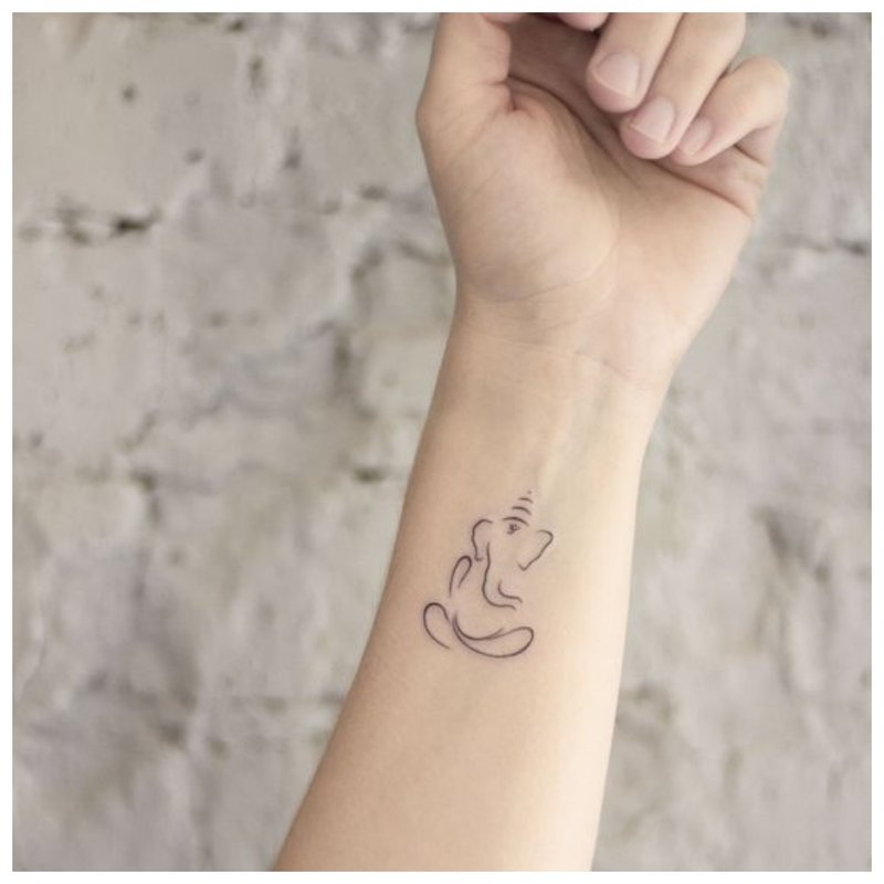 Tattoo on the wrist of a girl