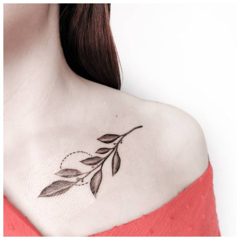 Neat twig - clavicle tattoo