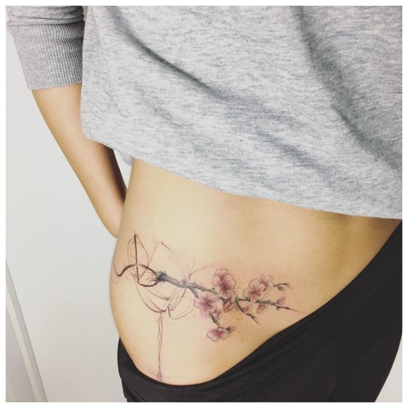 Small hip tattoo