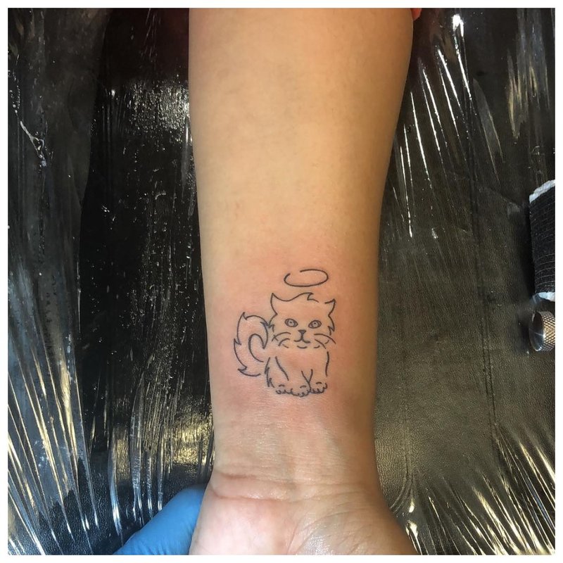 Animal wrist tattoo