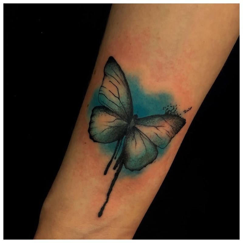 Butterfly - girls wrist tattoo