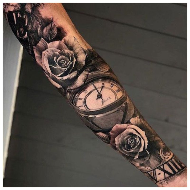 Bright male full arm tattoo