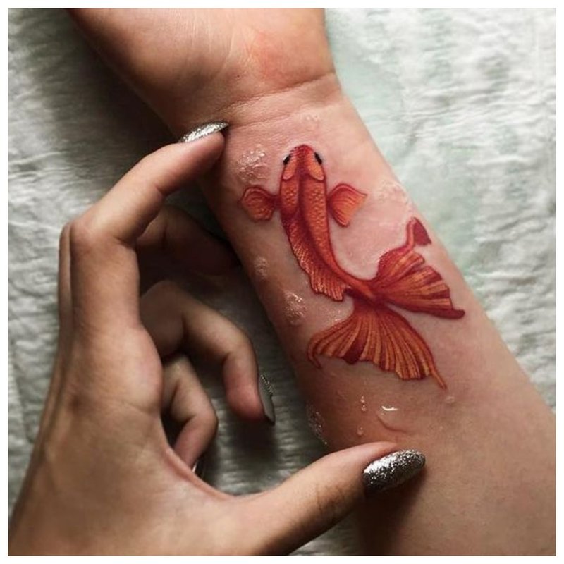 Fish - tattoo on the wrist