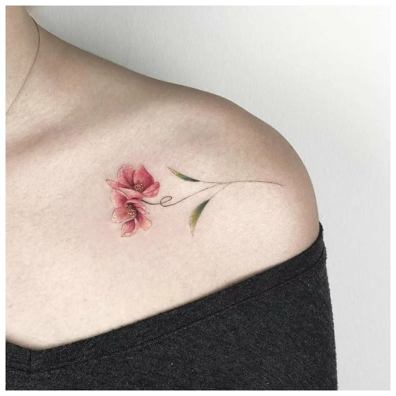 Flower theme for clavicle tattoo