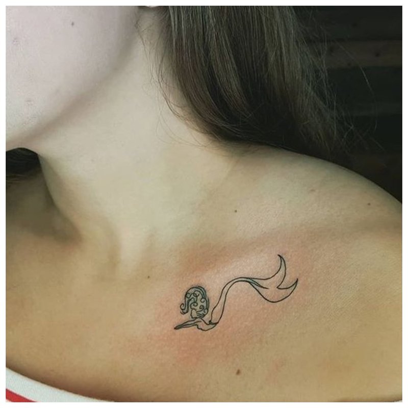 Small clavicle tattoo