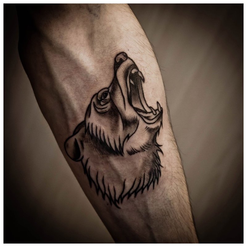 Animal tattoo on a man's forearm