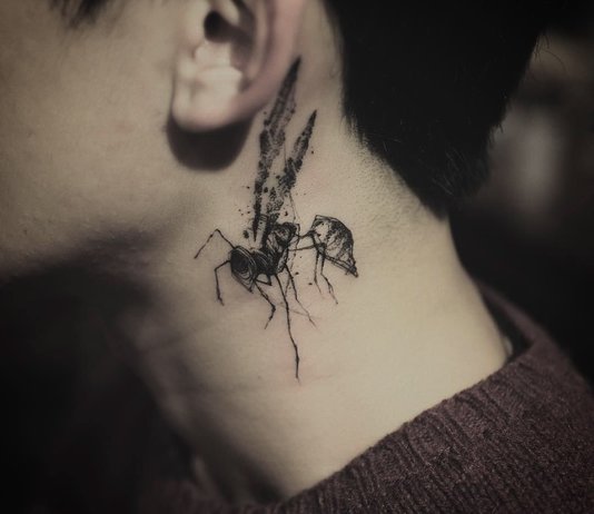 Beautiful and original tattoo on the neck