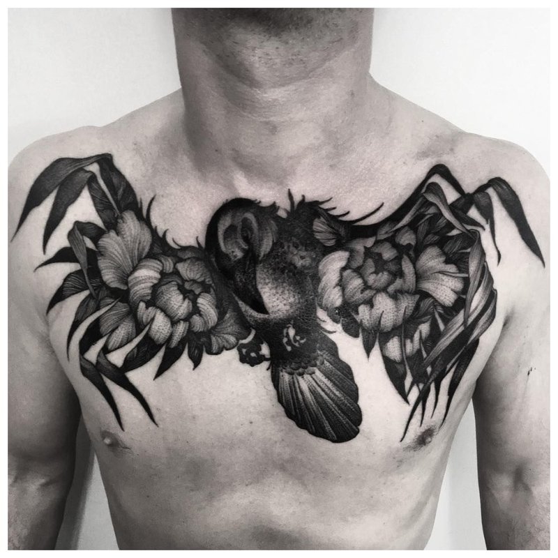 Bird tattoo in the style of a do-it-yourself chest on a man