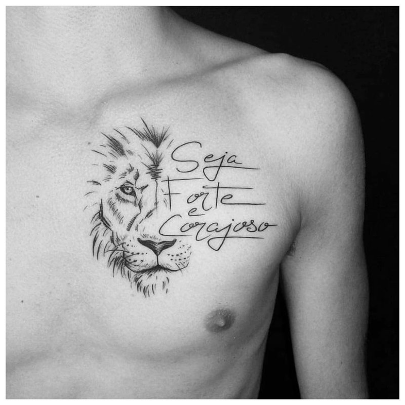 Tattoo inscription on the chest of a man