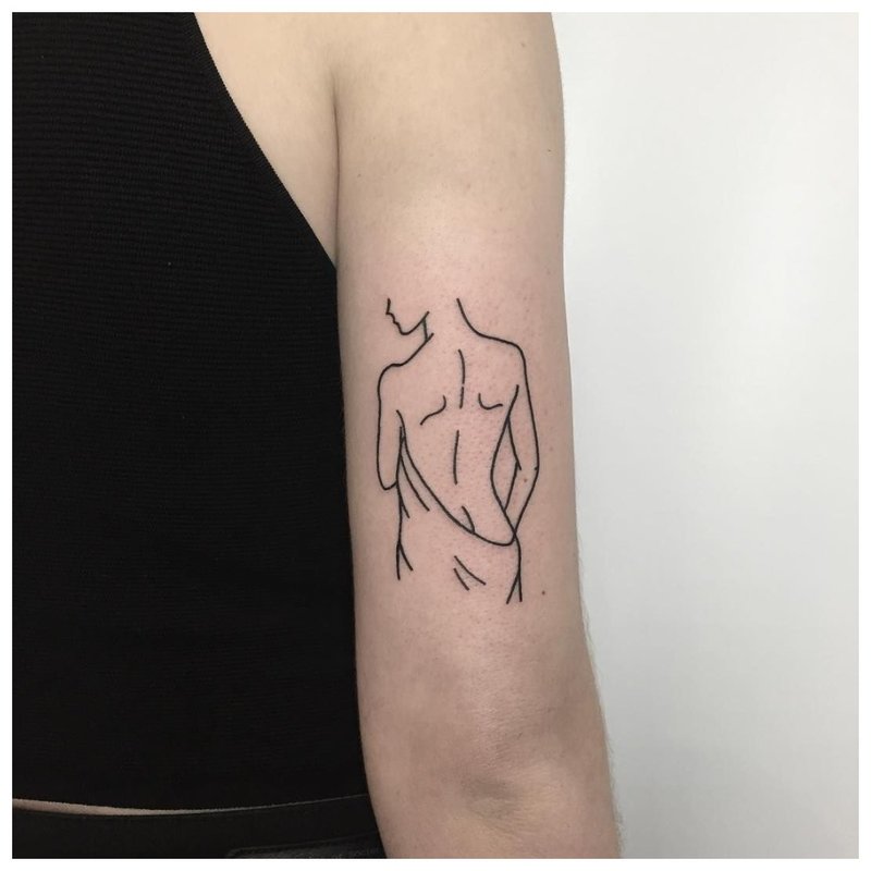 Contour tattoo with a silhouette of a girl