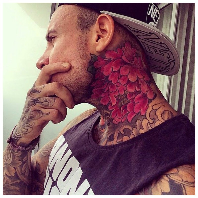 Bright flower tattoo on the whole neck of a man