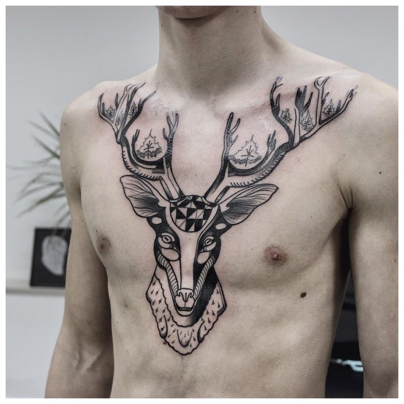 Deer tattoo on a man’s chest