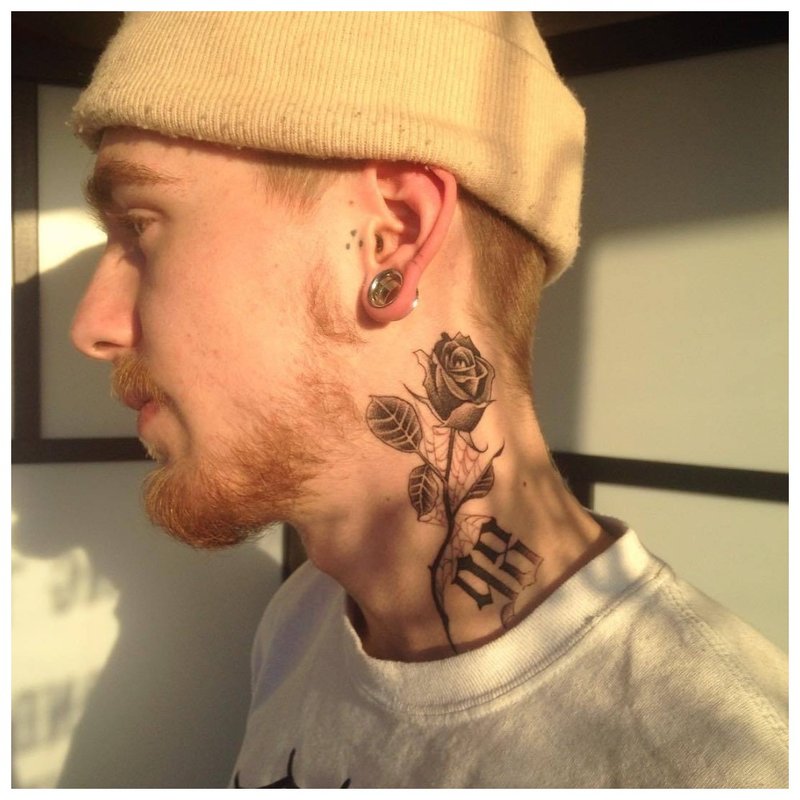 Tattoo on the neck of a man