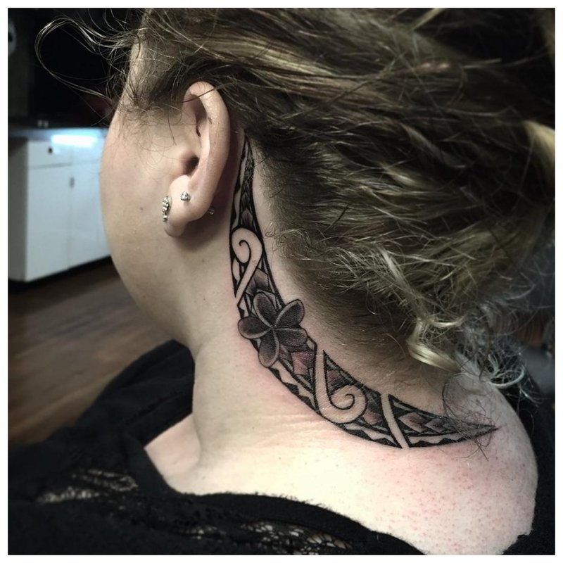 Tattoo on the neck of a girl