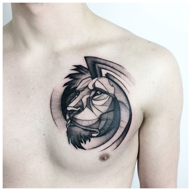 Wise lion - tattoo on the chest of a man