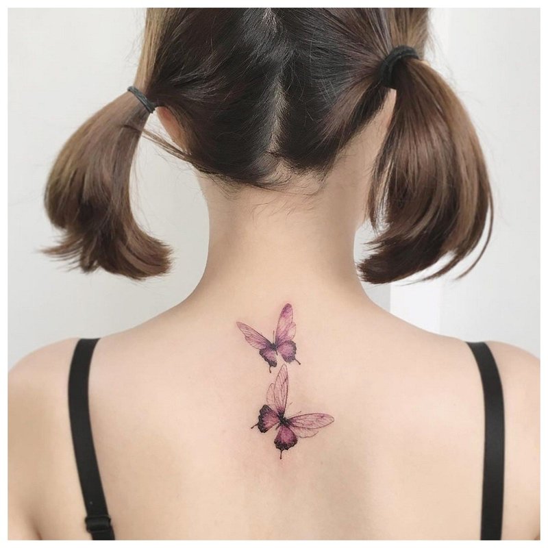 Tattoo on the back of a girl