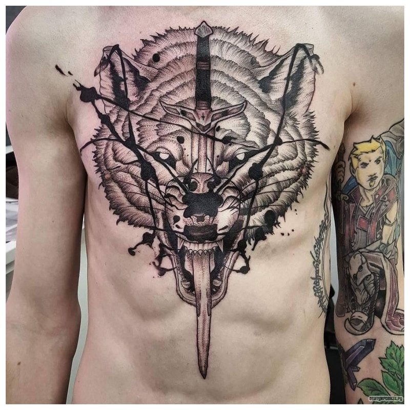 Predatory beast - a tattoo on a man's chest