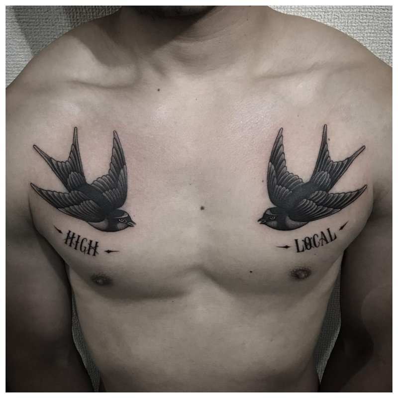 Tattoo inscription on the chest of a man