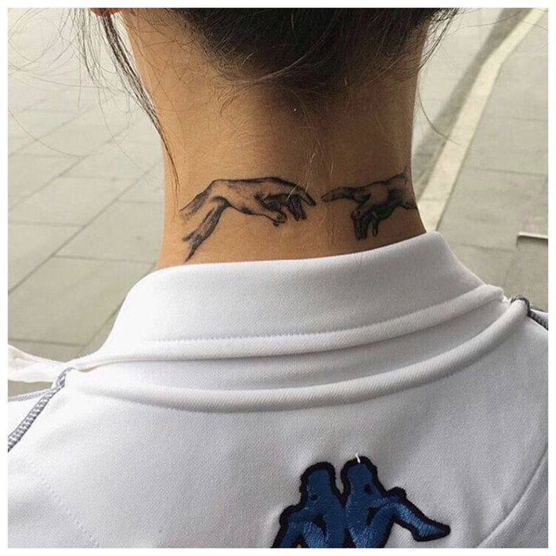 Arm tattoo on the back of the neck