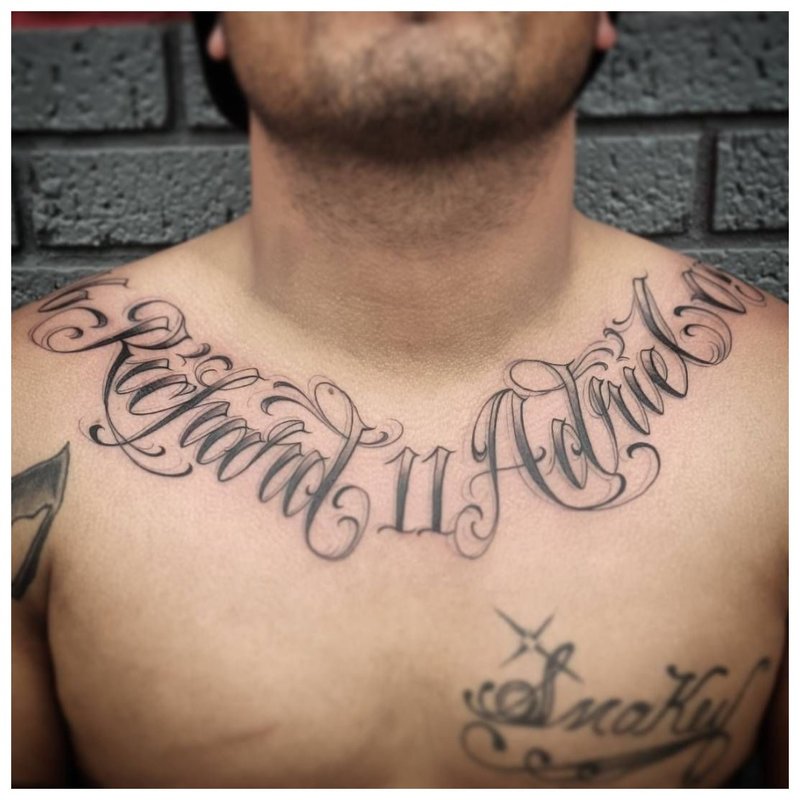 Tattoo on the chest and neck of a man