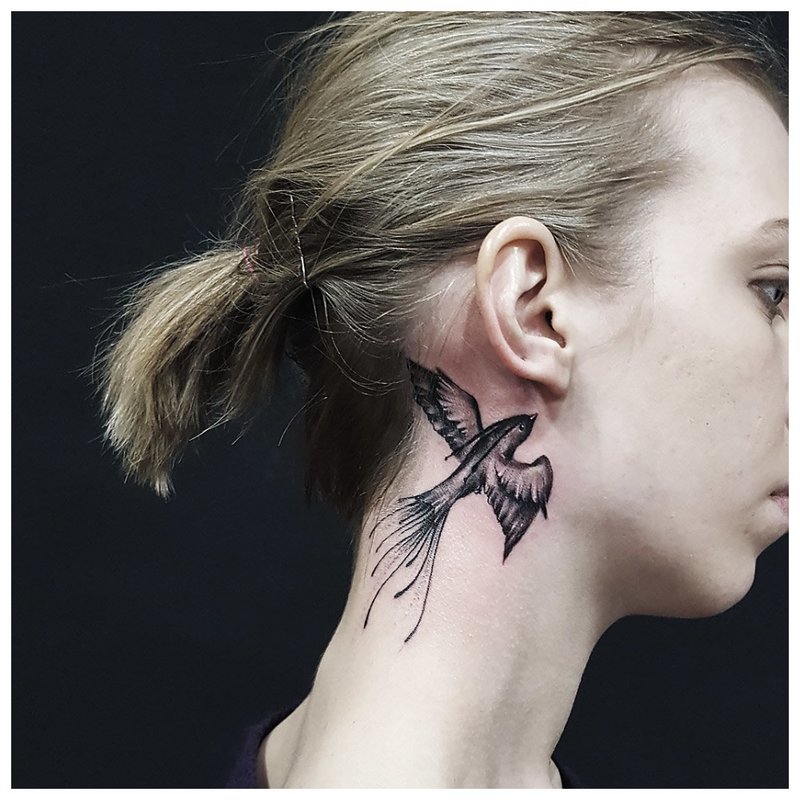 Bird Tattoo on the neck side