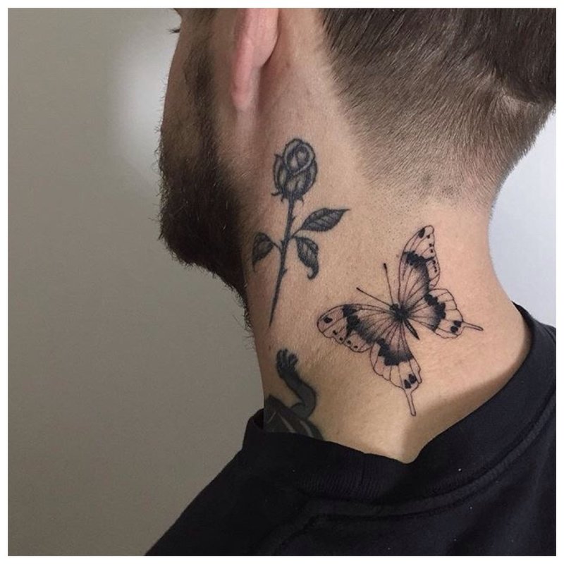 Flower and butterfly - tattoo on the neck of a man