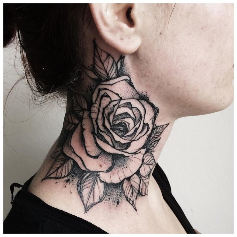 Large flower tattoo on the neck of a girl