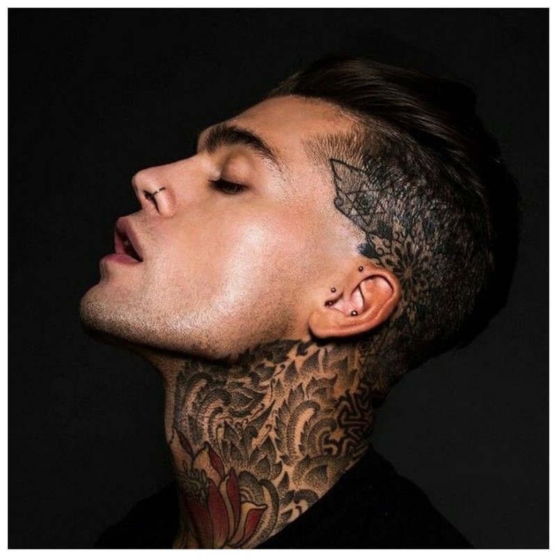 Tattoo on the whole neck of a man