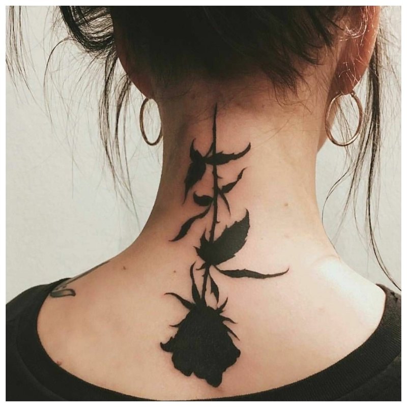 Tattoo on the girl's neck