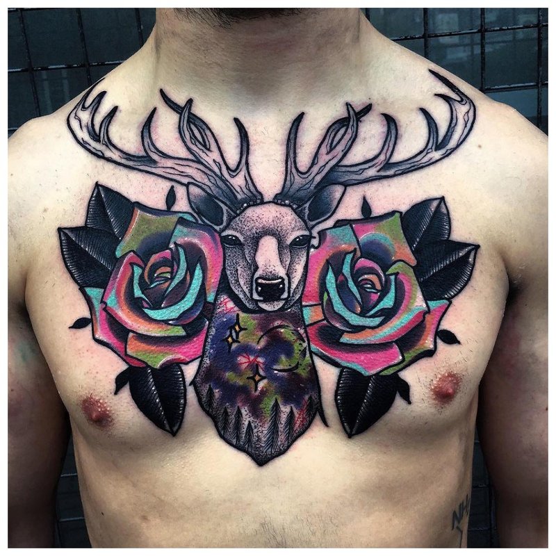 Bright flowers - tattoo on the chest of a man