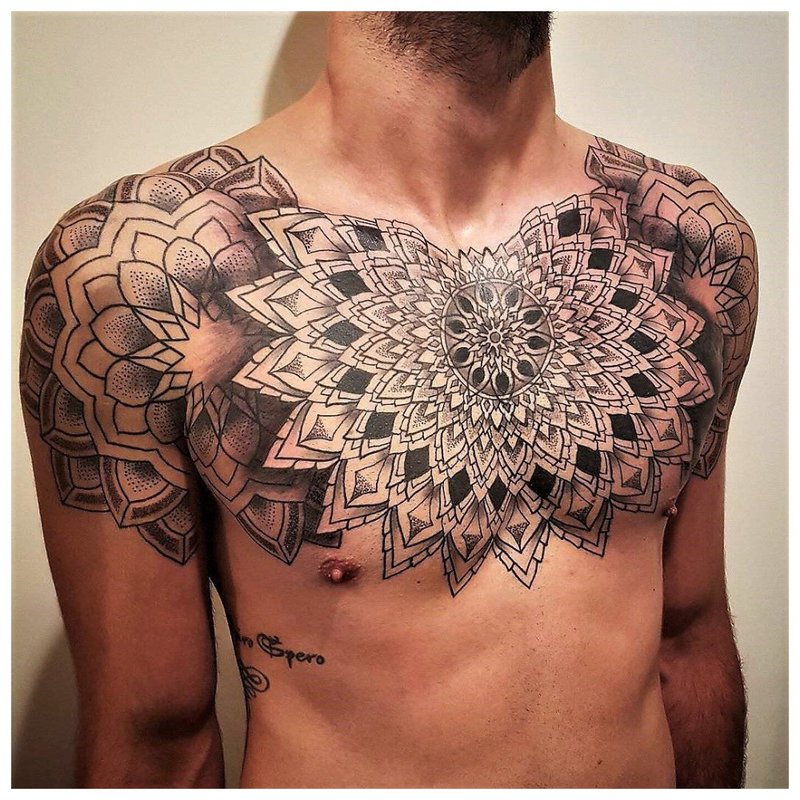 Original tattoo on the chest of a man