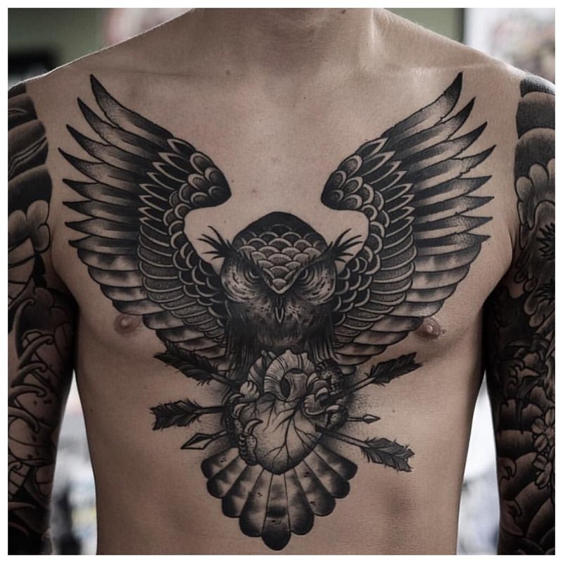 Bird - tattoo on a man's chest