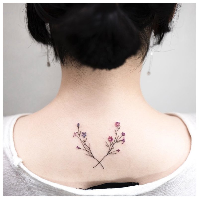 Tattoo with two colored branches