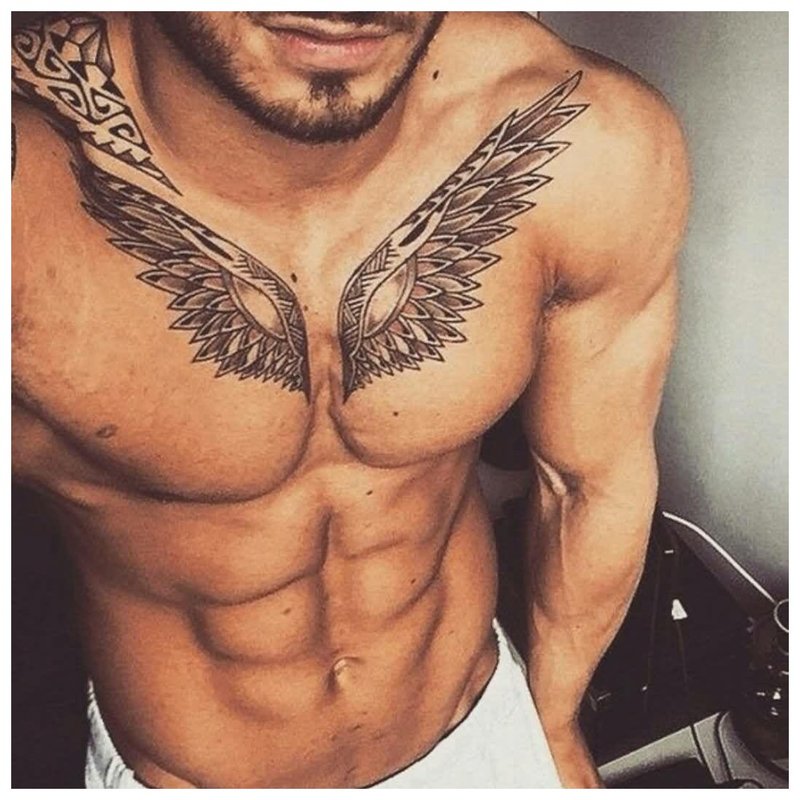 Tattoo bird wings on chest