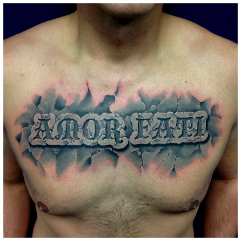 Beautiful colored tattoo on the man’s chest