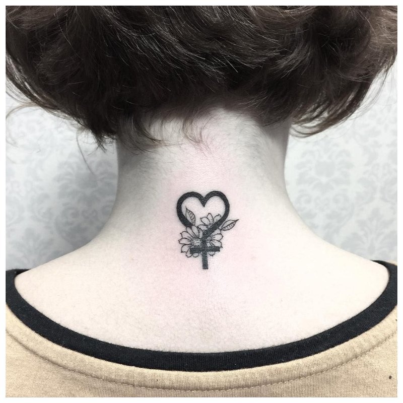 Delicate tattoo on the neck